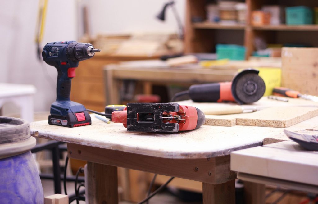 power tools on a wooden desk